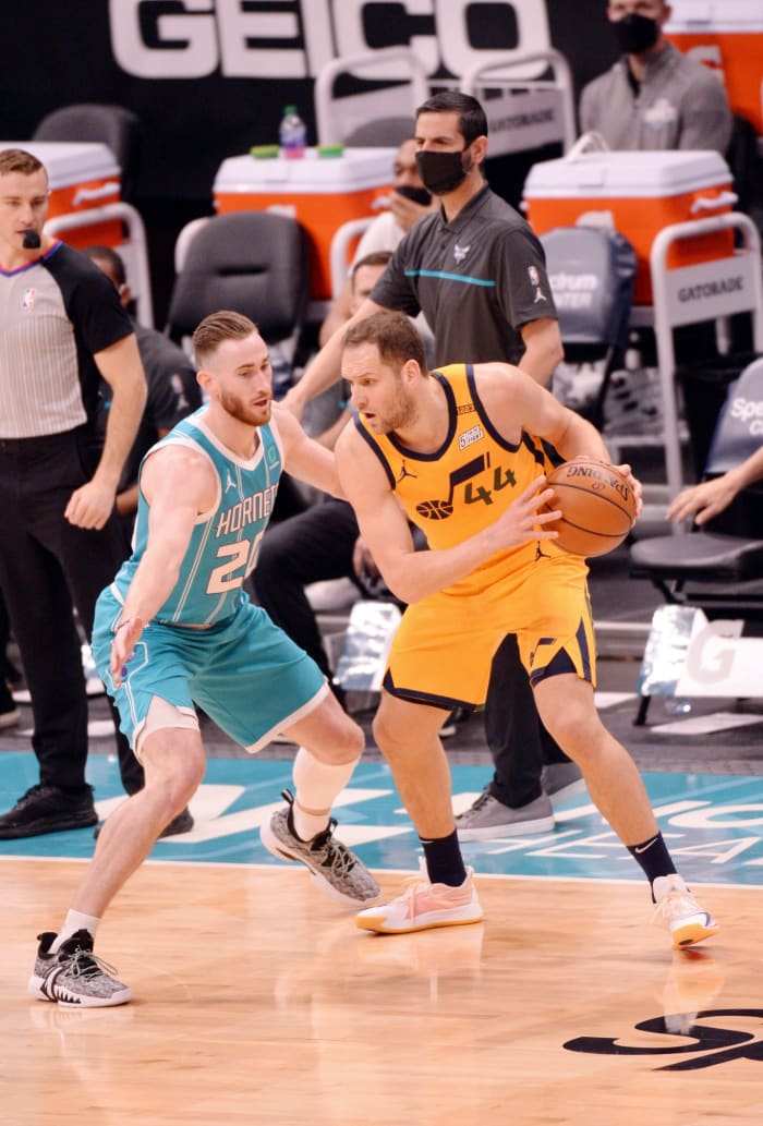 Bojan Bogdanovic (44) takes on Gordon Hayward (20)